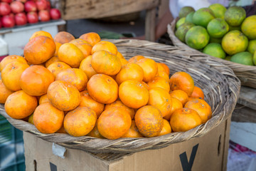 fresh mandarin group on basket from market