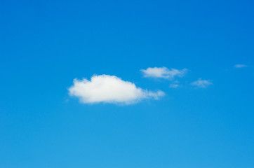 white fluffy clouds in the blue sky