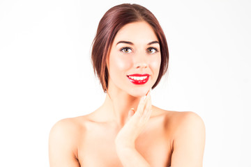 Woman with a perfect smile with white teeth. Sexy woman with red lips touching chin.