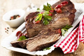 Baked beef with cherries