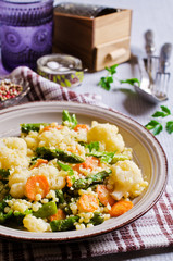 Round pasta with vegetables