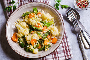 Round pasta with vegetables