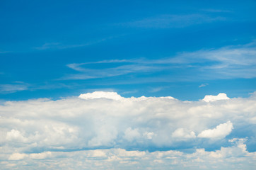 white fluffy clouds in the blue sky