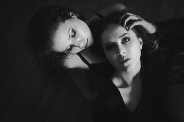 Portrait of two beautiful, fashion, sensual brunette models