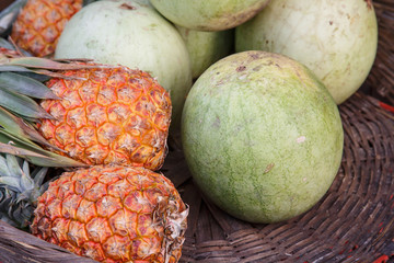 fresh pineapple with watermelon group from market
