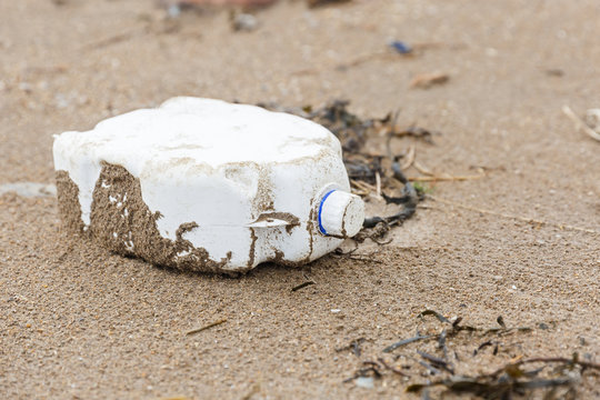 Plastic bottle litter on the beach