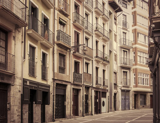 Fototapeta na wymiar Urban street in Bilbao, Spain. Retro toned.