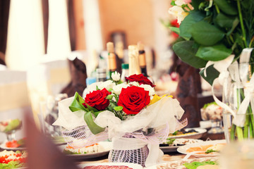 red roses on a holiday table