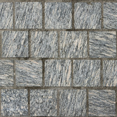 Dark gray mosaic tile stone.Material construction.