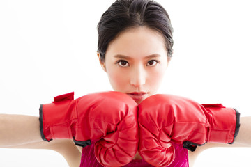 fitness young woman  wearing red boxing gloves