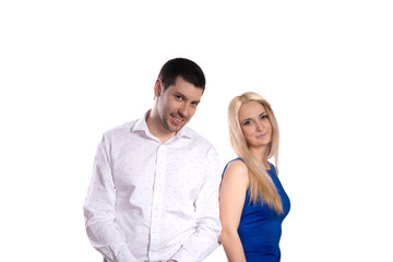 young couple stand and smile