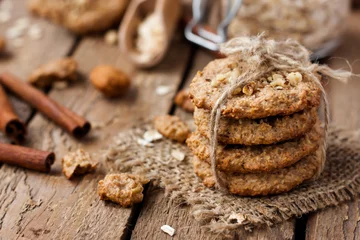 Foto op Plexiglas homemade oatmeal cookies with nuts © yuliiaholovchenko