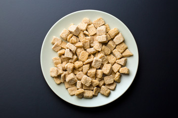 unrefined cane sugar on plate