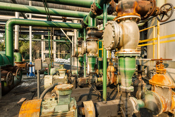 Fototapeta na wymiar old industrial pipeline equipment in a abandoned steel mills