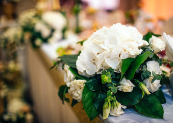 Flowers in a vase for the wedding ceremony
