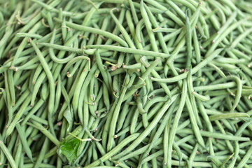 Fresh green beans on  farmer agricultural market