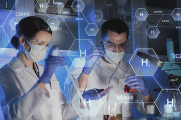 close up of scientists making test in lab