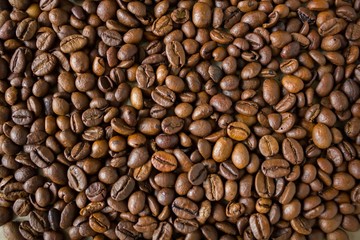 Lot of black coffee beans background