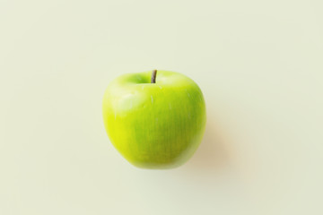 ripe green apple over white