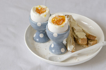 Scramble eggs with toast and butter for breakfast     