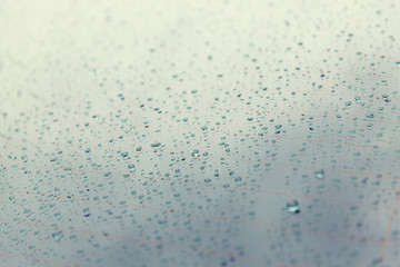 close up of wet rear car glass