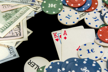 Casino chips, card and US dollars