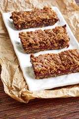 three raspberry granola bars