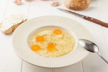 Chicken broth with noodles