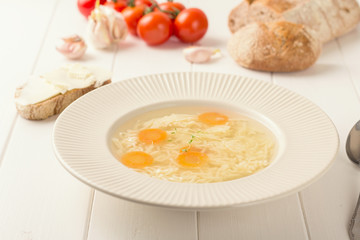 Chicken broth with noodles