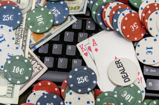 Casino chips, card and US dollars