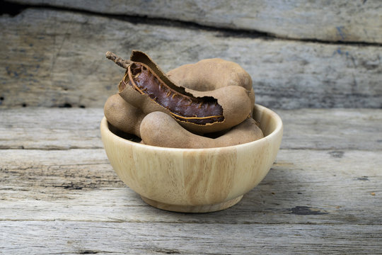  tamarind on grunge wooden background