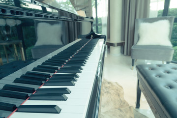 piano keyboard in the living room, selective focus and vintage p