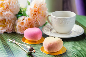French mousse cake in pink chocolate velour