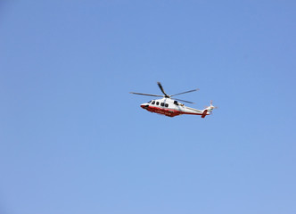 Fototapeta na wymiar police helicopter flying through the air