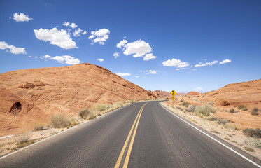 Fototapeta na wymiar Picture of a scenic desert road, USA