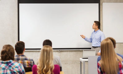 group of students and teacher in classroom