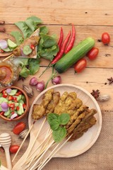 Pork satay,grilled pork with peanut sauce .