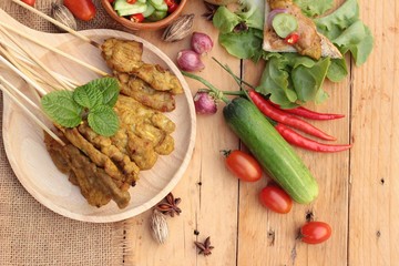 Pork satay,grilled pork with peanut sauce .