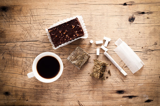 weed marijuana hashish roll wood background