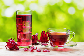 Cup of hot hibiscus tea and the same cold drink with ice