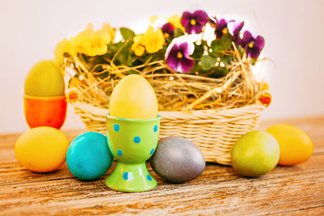 Easter composition with easter eggs and flowers