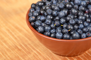 Blueberry on wooden background