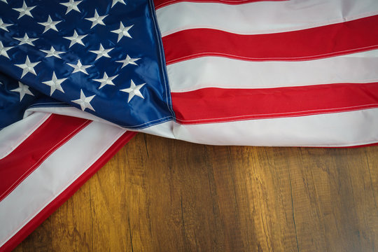 American flag on wood background