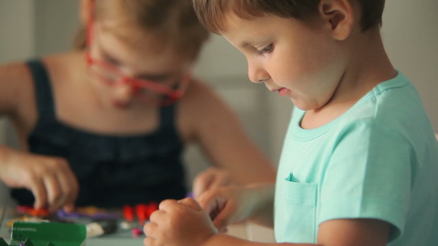 Boy and girl mold from plasticine