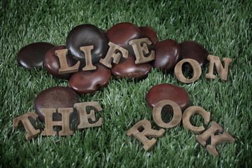 Phase of Life on the rock in wooden design, motivation concept