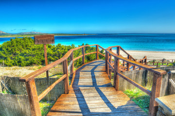 wooden stairs to the beach in Sardinia