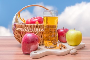 Cider - hot apple beverage on wooden table