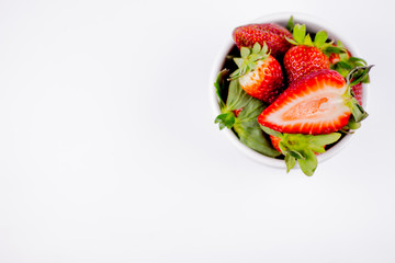 Half of strawberry isolated on white background