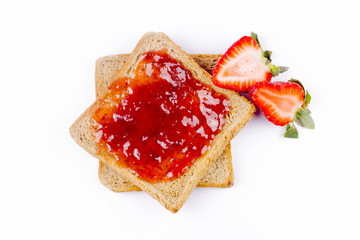 sweet strawberries jam on toast close up