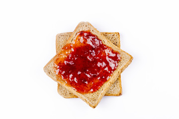 sweet strawberries jam on toast close up